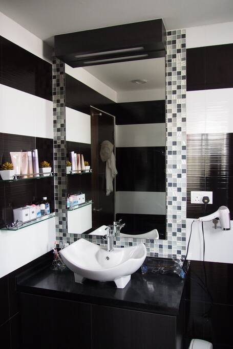 private toilet with heater and essensials such as towels and soap for a quick stopby