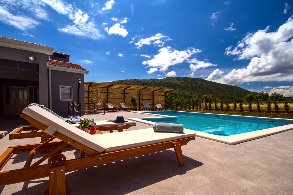 comfortable Pool area next to the Sommerkitchen