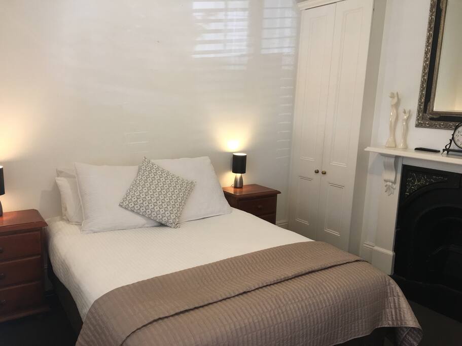 Bedroom 1: Queen size bed, TV , ornamental fire place, ceiling fan and ducted heating