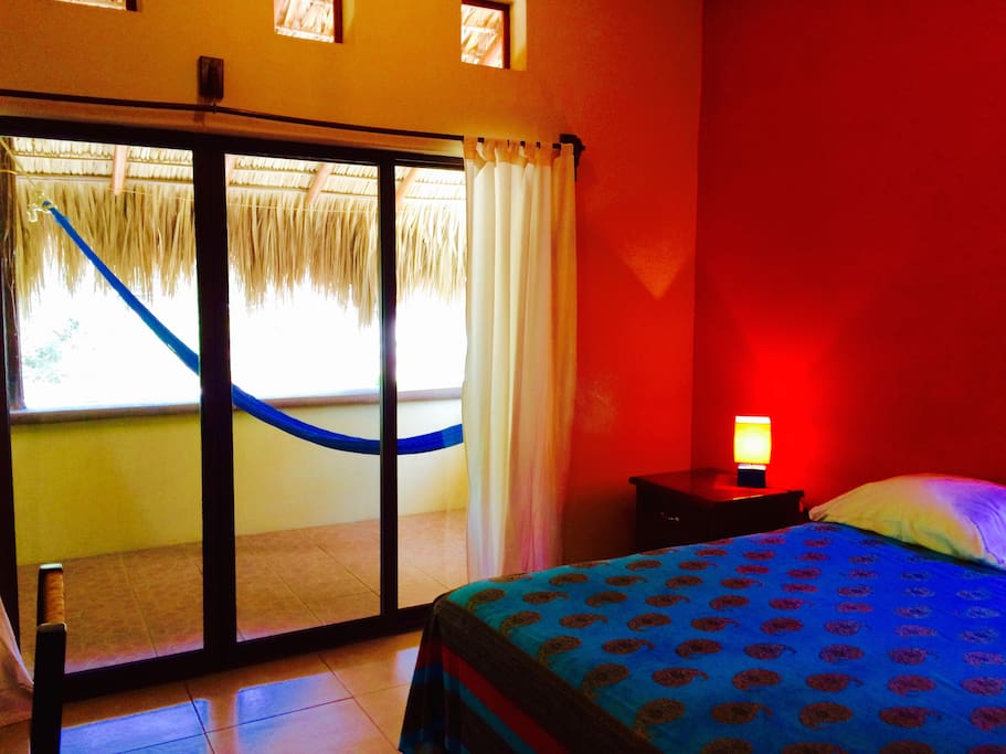Front bedroom with 1 Queen size and balcony with Hammock