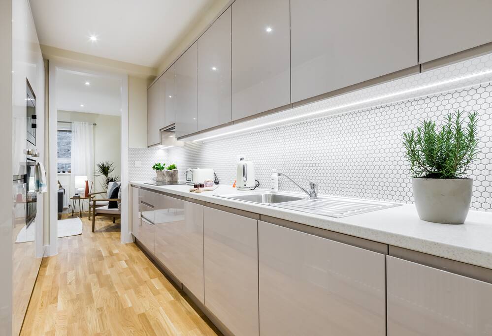 The kitchen connects the dining area and the living space.