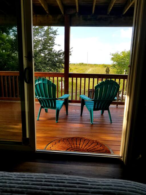 Sliding glass door provides convenient access and fantastic views. Watch Naval and commercial ships pass by while you get ready for your day.