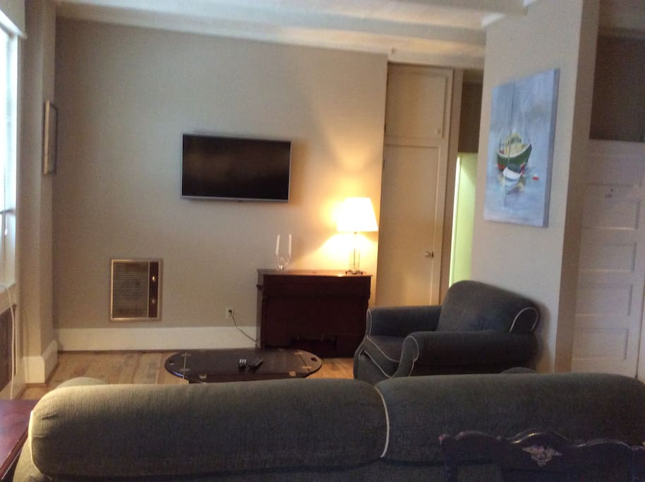 Den with Flat Screen TV with cable and internet.