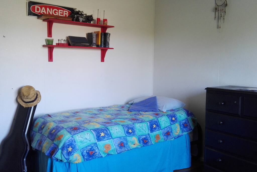 The second bed in the room.