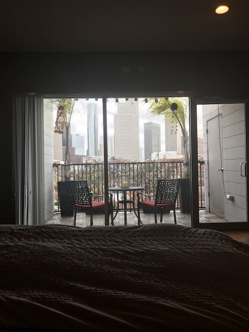 View from the bed with curtains open