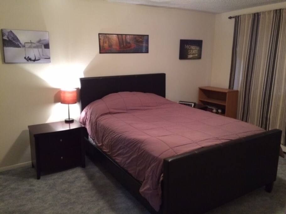 Master bedroom with queen bed (most of the closet space is in the 2nd bedroom FYI)
