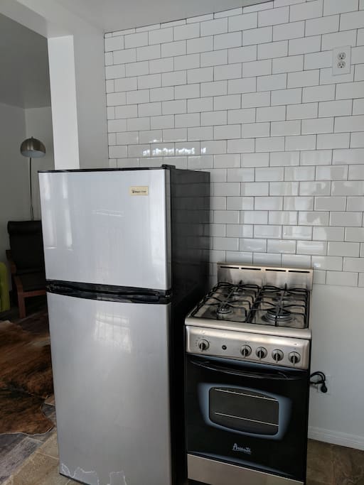 Small stainless steel Fridge and oven