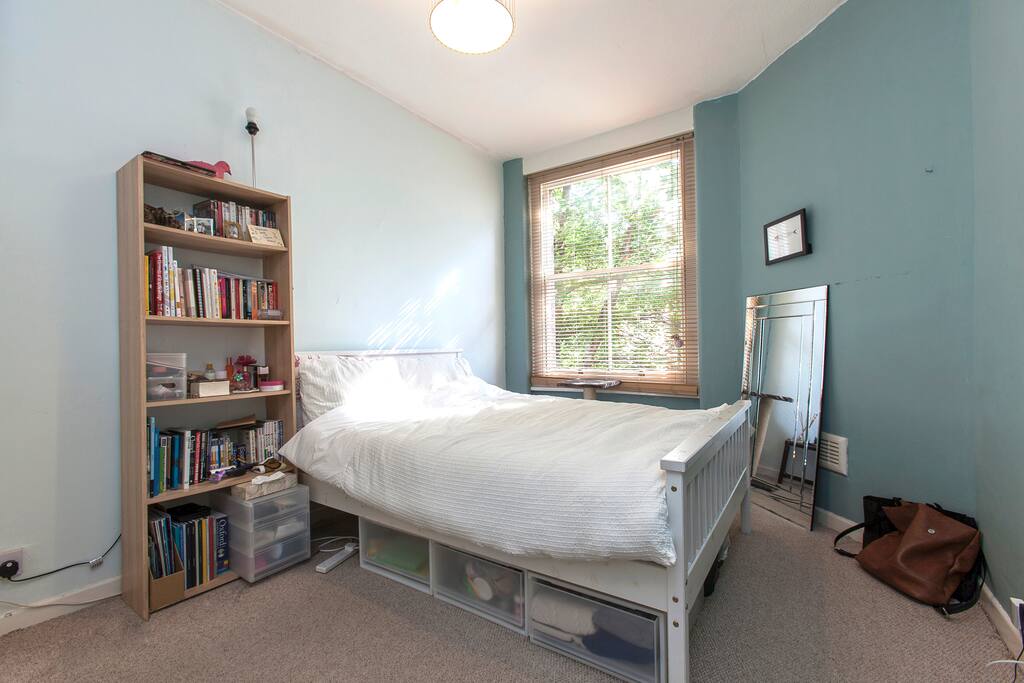 Comfy Double bed overlooking garden.
