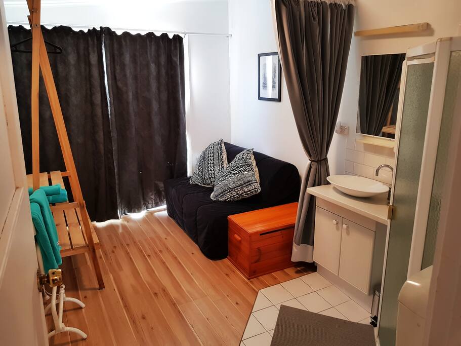 Sitting area and luggage storage.