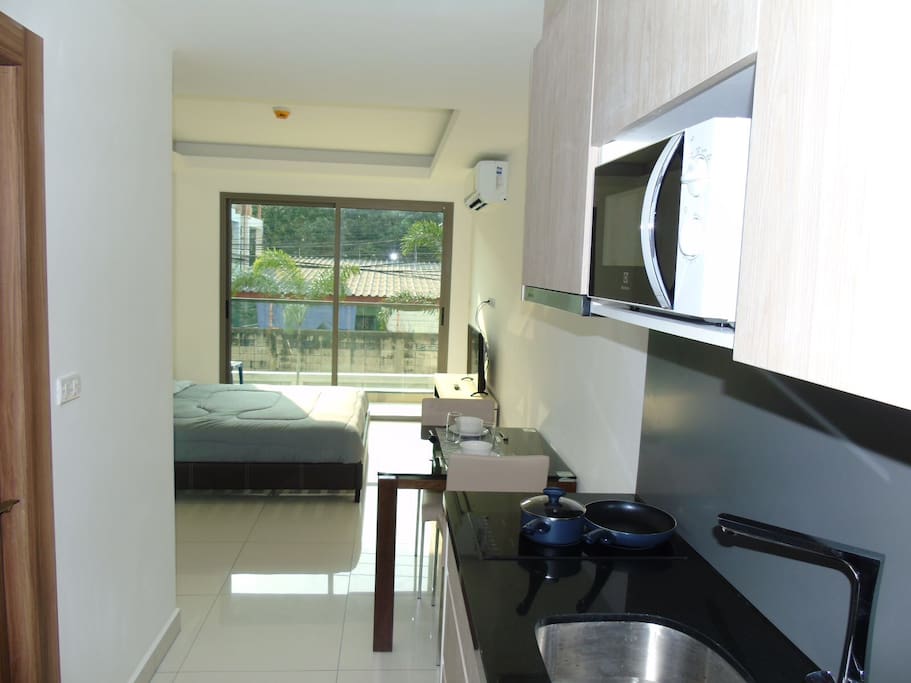 Small kitchen with microwave and 2 ring cooking hob