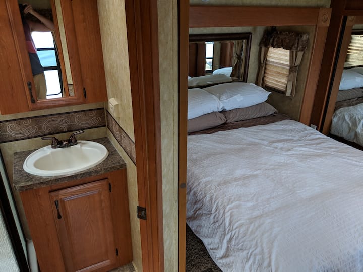 Cozy queen size bed.  Linens provided.