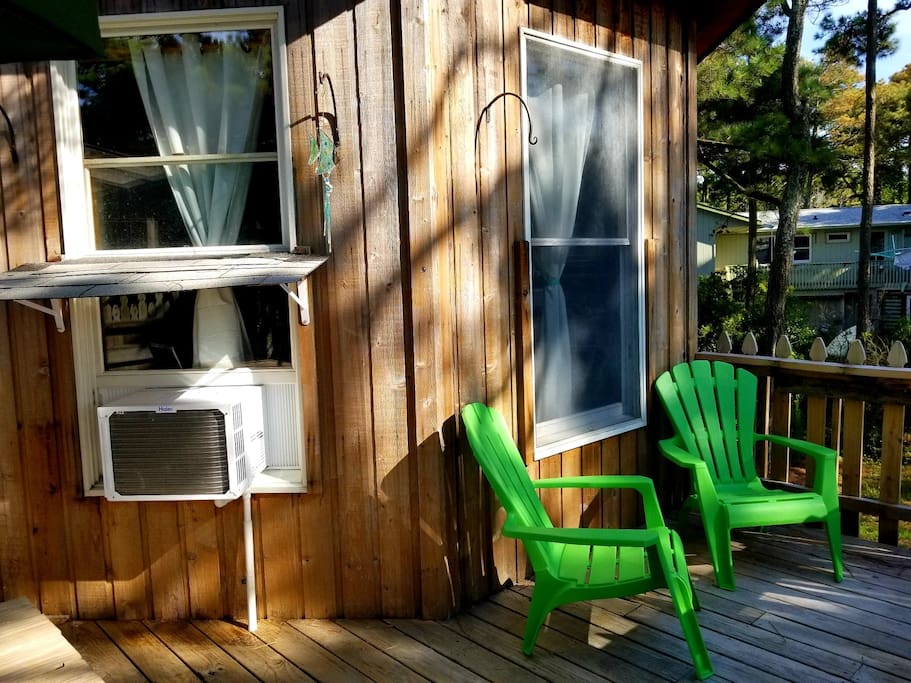 Adirondack chairs overlooking backyard