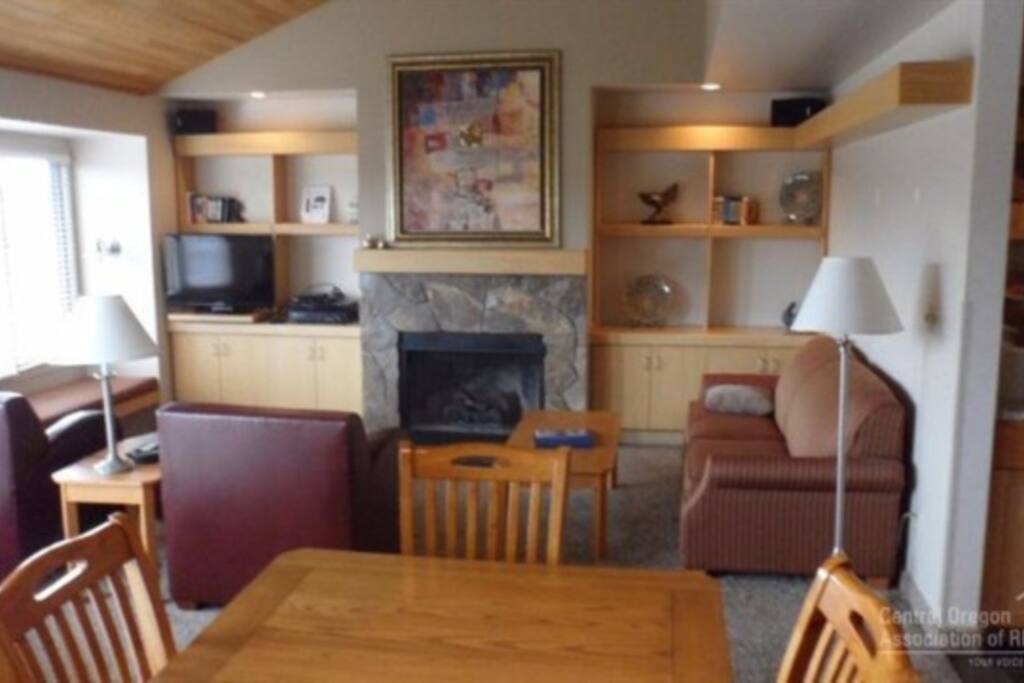 Fireplace, built in book shelves, TV, Sleeper sofa