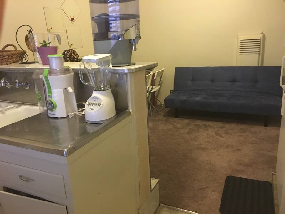 Spacious kitchen with fridge and stove