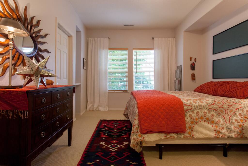 Guest suite overlooks quiet cul-de-sac with street view.