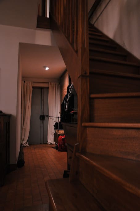 stairs to the mezzanine bed room and bathroom