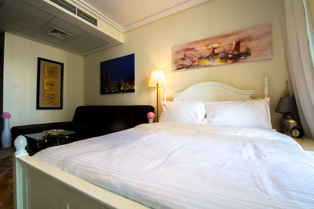 Comfortable big bed with fresh linen