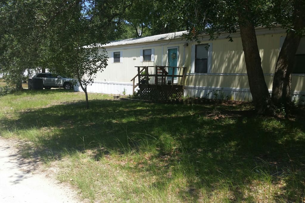 Corner lot with plenty of parking for vehicles and boats. Yellow house with a big W on it!