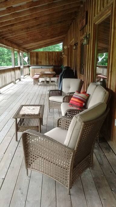 Huge covered patio with hot tub , BBQ and crab cooker