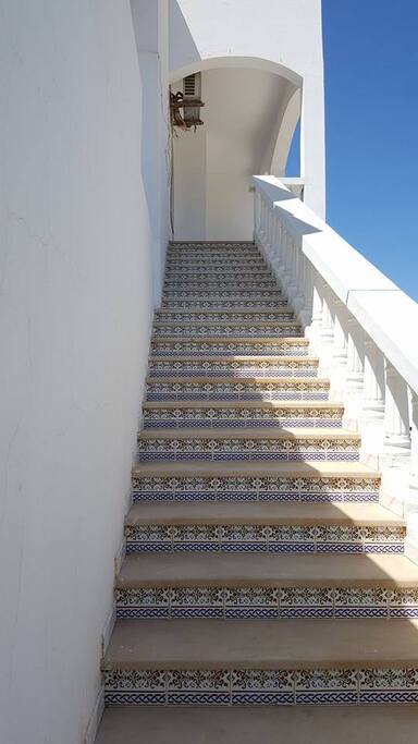 escalier menant à l'appartement