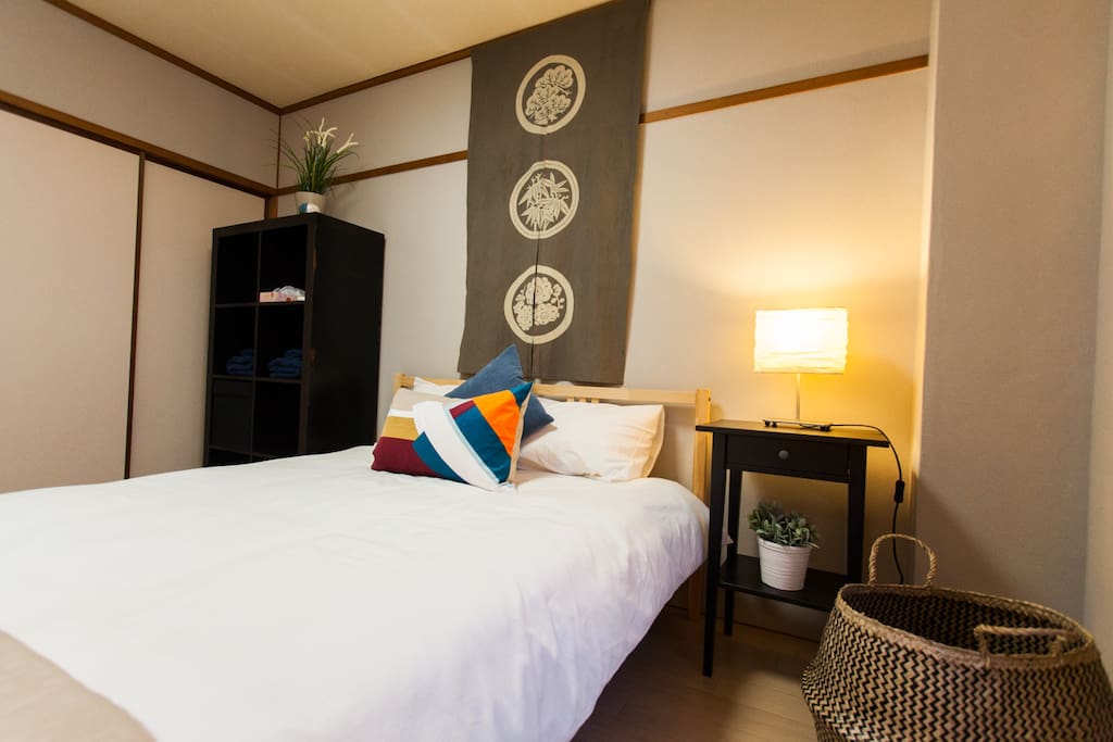 the bed is a full-sized double bed with awesome mattress and down duvet