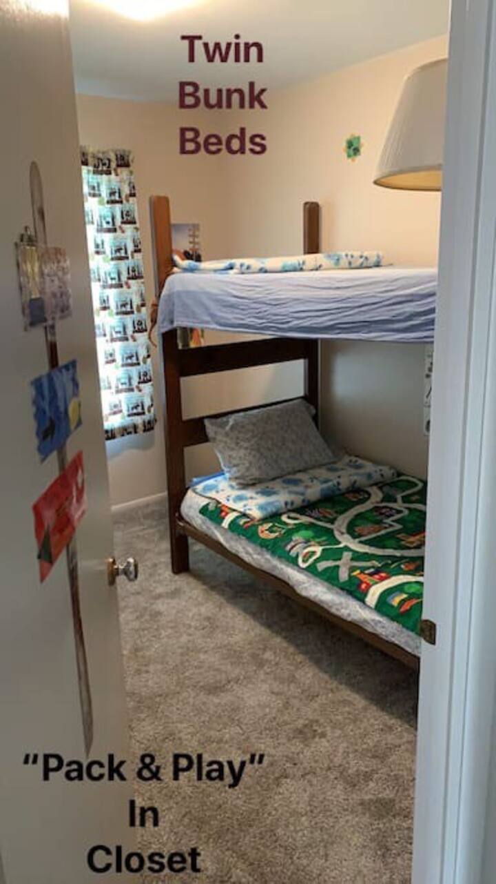 We call this room ‘Cabin #33’. Very kid friendly. There is a Pack & play in the closet to use while you are staying for your littlest guest. 
*There ARE 4 beds in this home: a queen, a double, & a bunkbed.