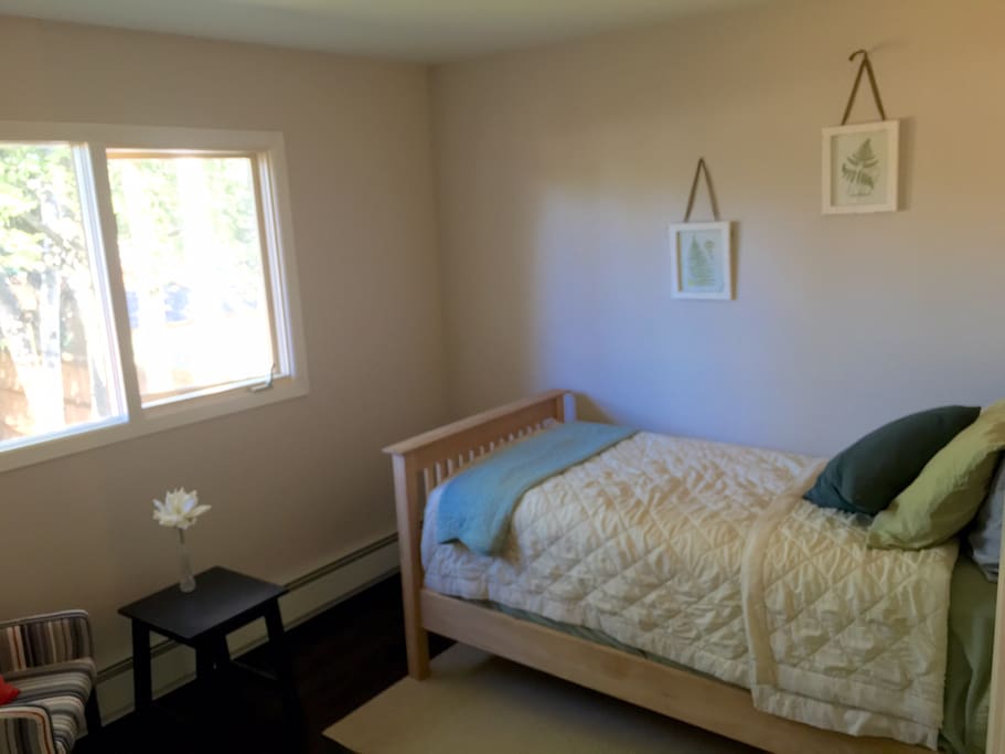 Second bedroom with tons of natural light, overlooking your private backyard.