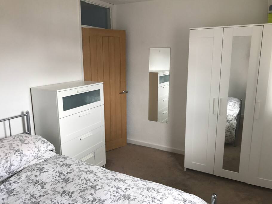 Two identical bedrooms with storage space.