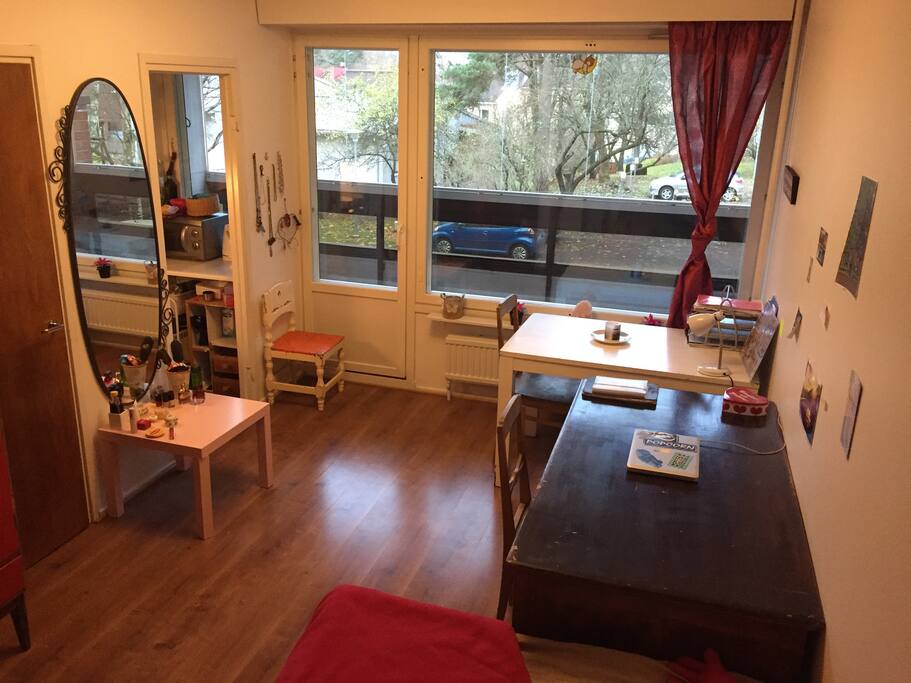 The main room. Dinner table and office table. Bed for 2.