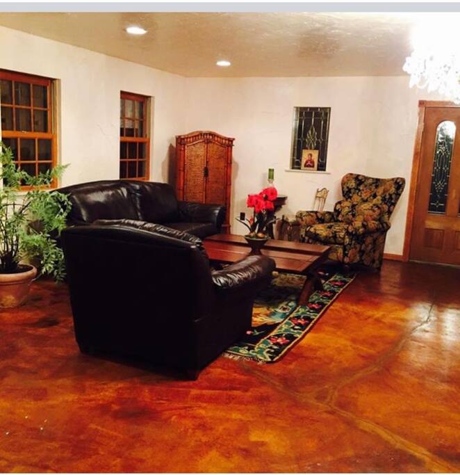 A sitting area for you with balcony. Radiant concrete floor heat.