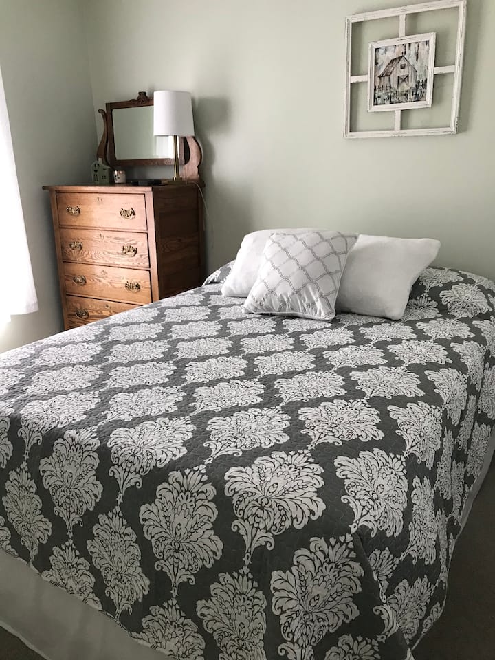 Bedroom 2 - double bed with dresser and tv