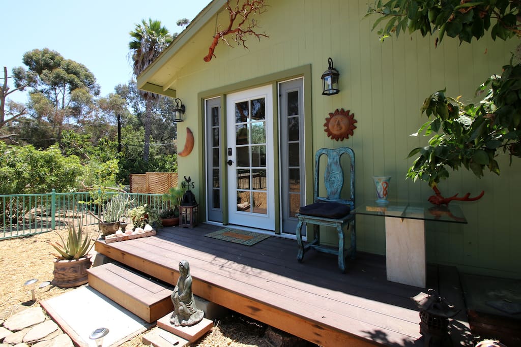The outside porch has a sitting chair and table and is usually in the shade if the sun gets too hot!