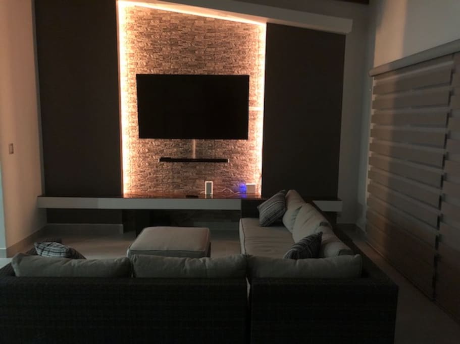living room with 70' smart tv