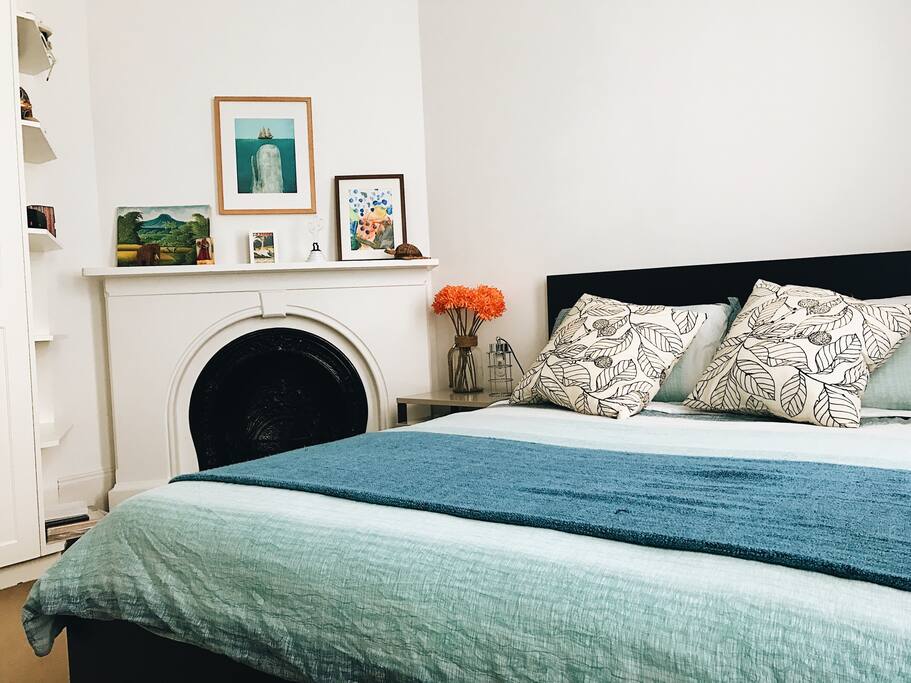 Bright and airy front bedroom with queen sized bed