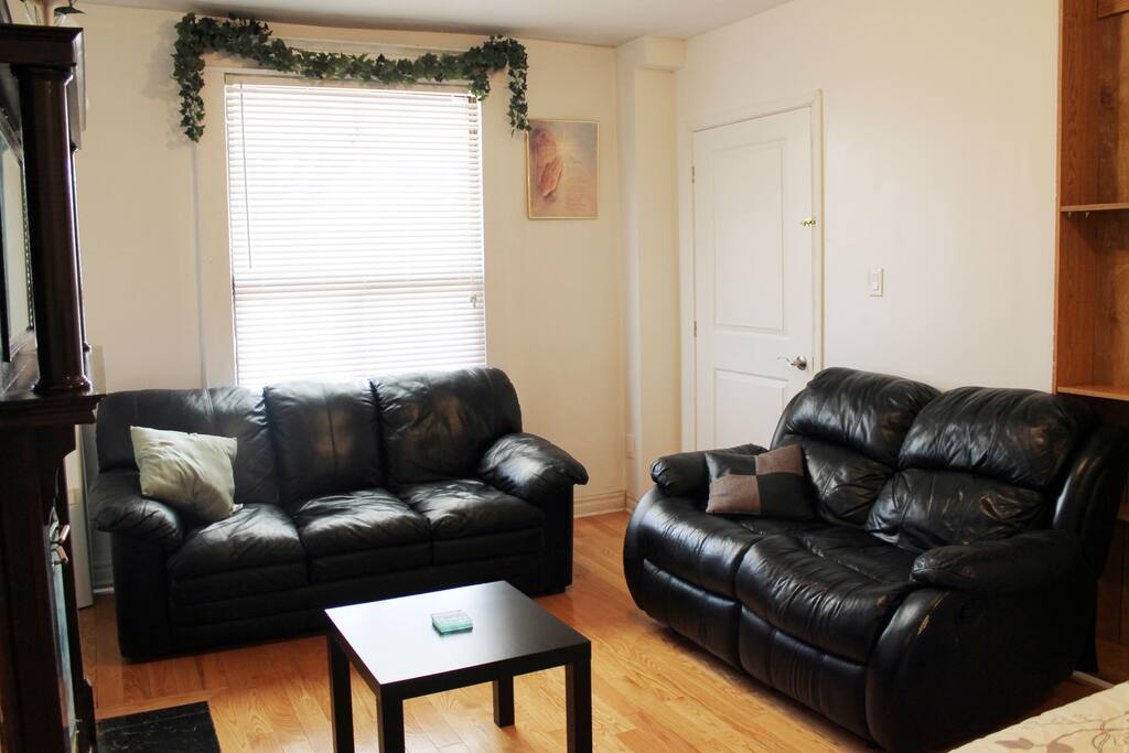 Genuine real leather sofas and hardwood floors. Sit back, sink in and relax.
