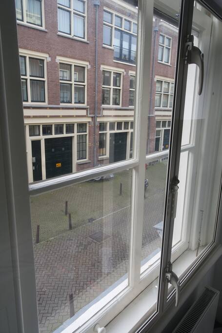 View of the street from the bedroom.
