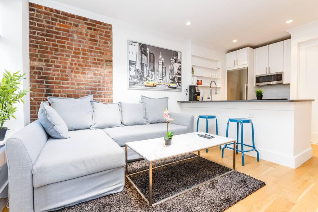 Recessed lighting, updated furnishings and exposed brick show you the best NYC has to offer!