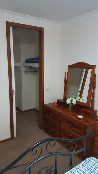 WALKIN ROBE WITH DRESSER AND MIRROR