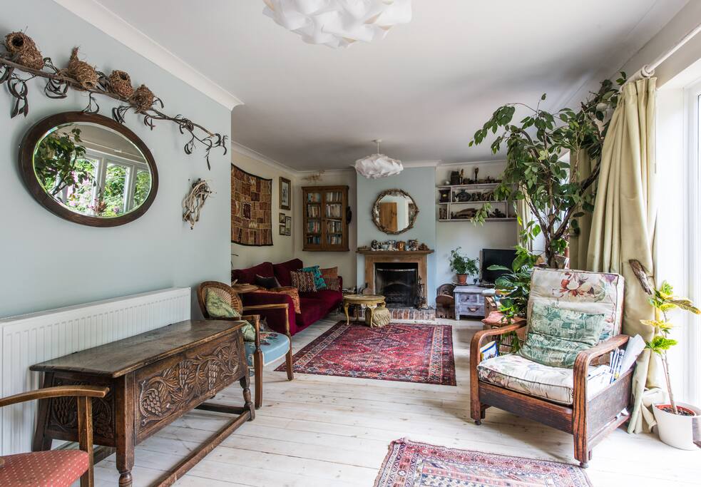 Living room that opens onto south facing natural pool.