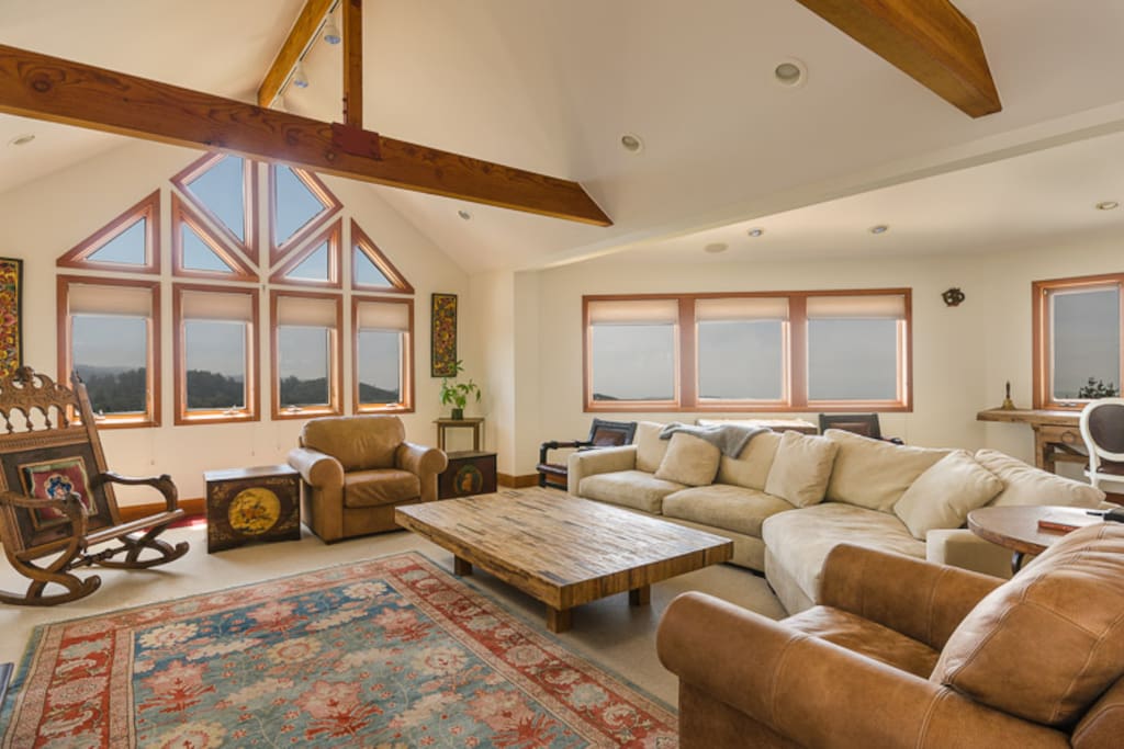 Entertainment room with beautiful ocean views, large screen tv, and plenty of games and movies