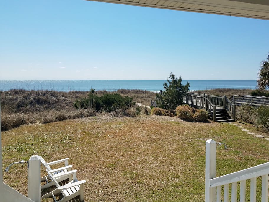 Step off your private deck and follow the path down to the beach.
