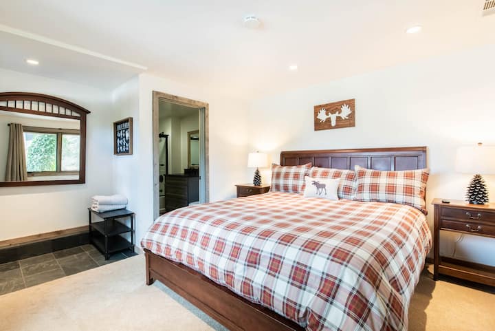 Bedroom #4 is downstairs with a Cal King, private bath, and separate entry