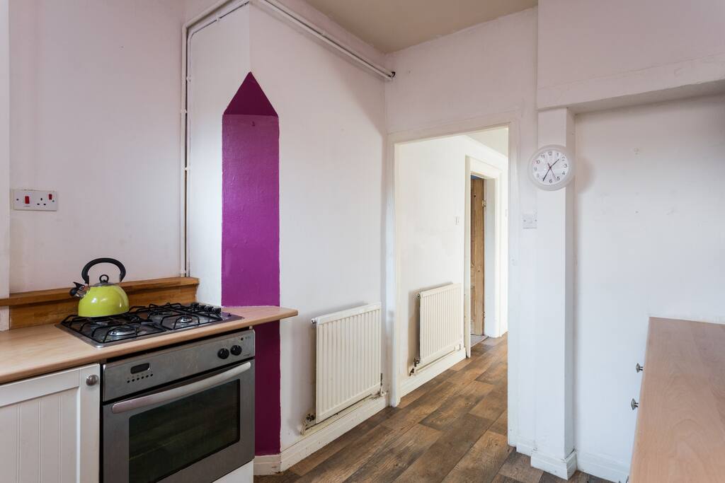 Another view of the cute and well equipped kitchen.