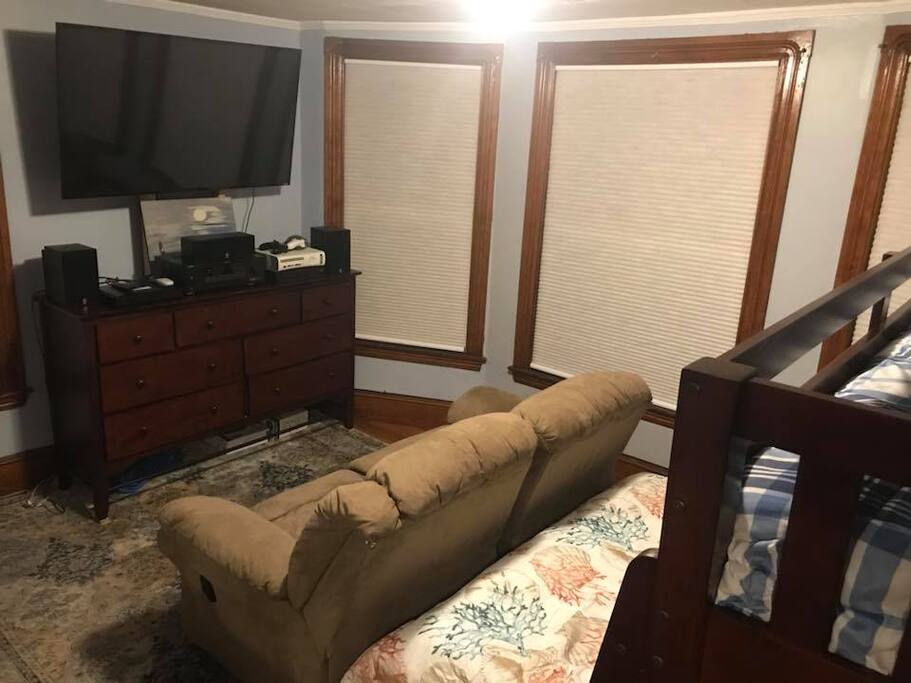 There is a large screen TV inThe Oceanside Sunrise Room. With DirecTV/HBO, and video games.