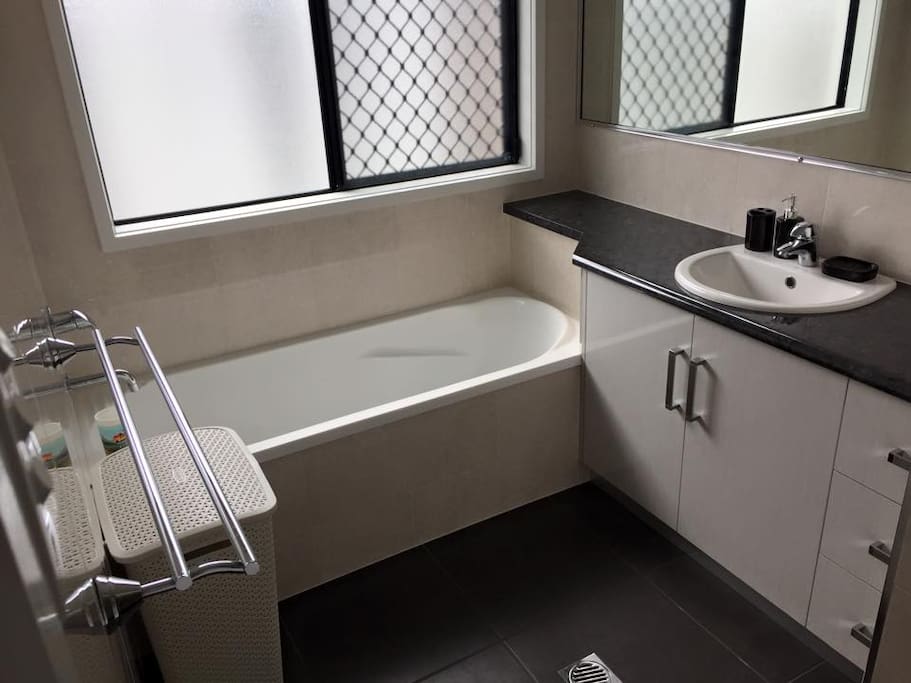 2nd bathroom with Bath and shower.