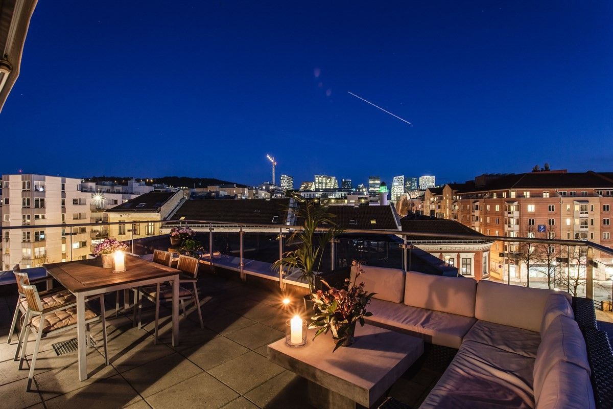 Image showcasing A Scandinavian Penthouse Apartment with Slanted Ceilings