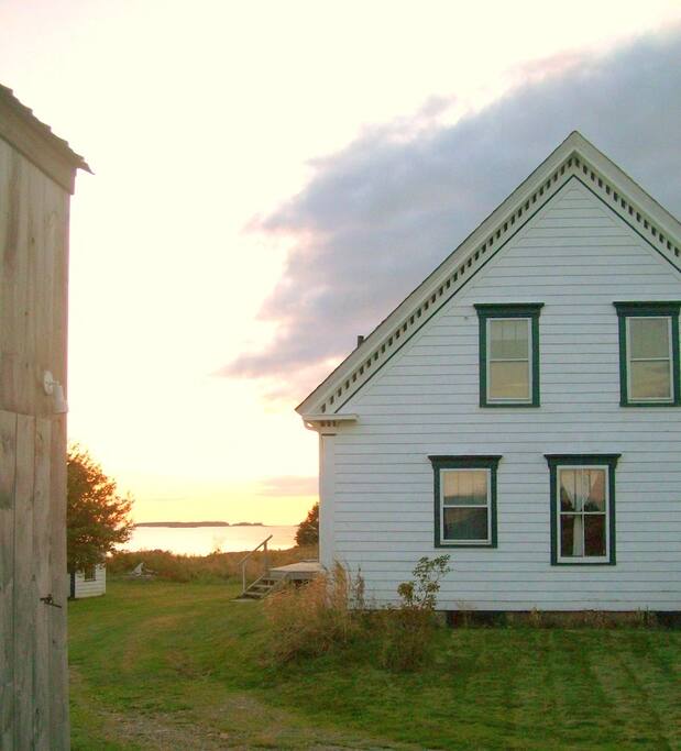 View of house and backyard. (Grassy path to ocean.)