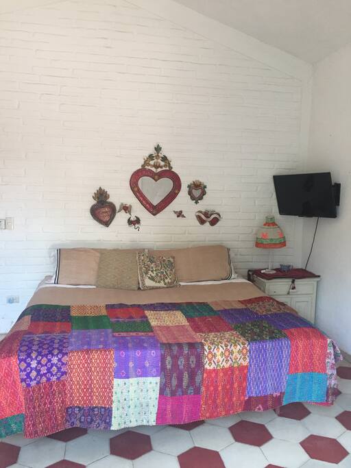King size pillow top bed and swivel tv for easy watching