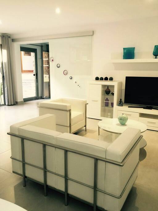 Living room and Bed room with window door to the patio