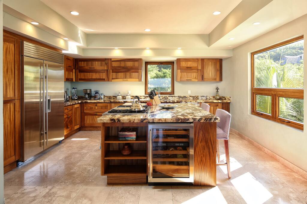 Full gourmet kitchen with Wolf Stove and Sub-Zero Fridges.